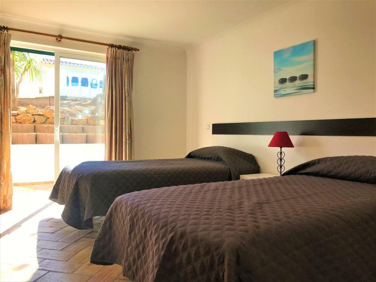 Casas Da Vila Praia Da Luz Bagian luar foto
