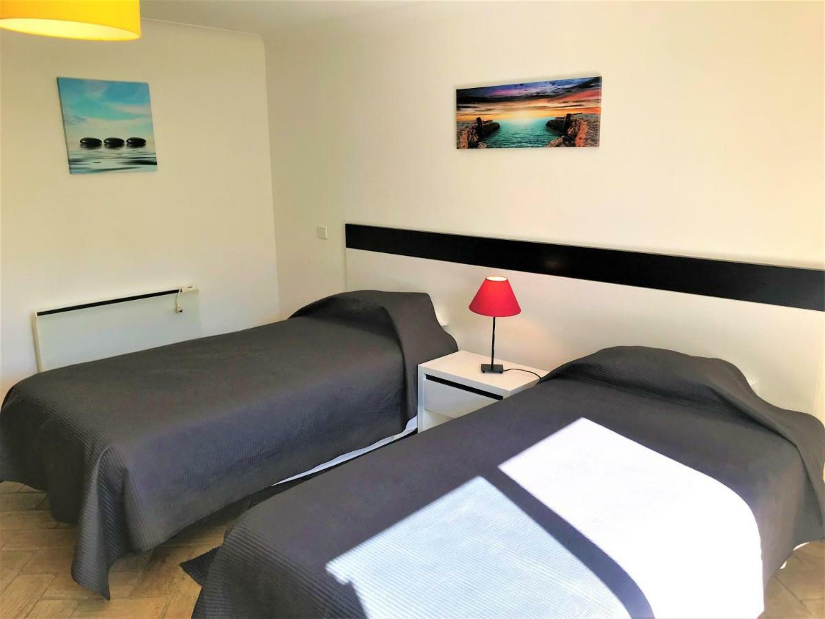 Casas Da Vila Praia Da Luz Bagian luar foto