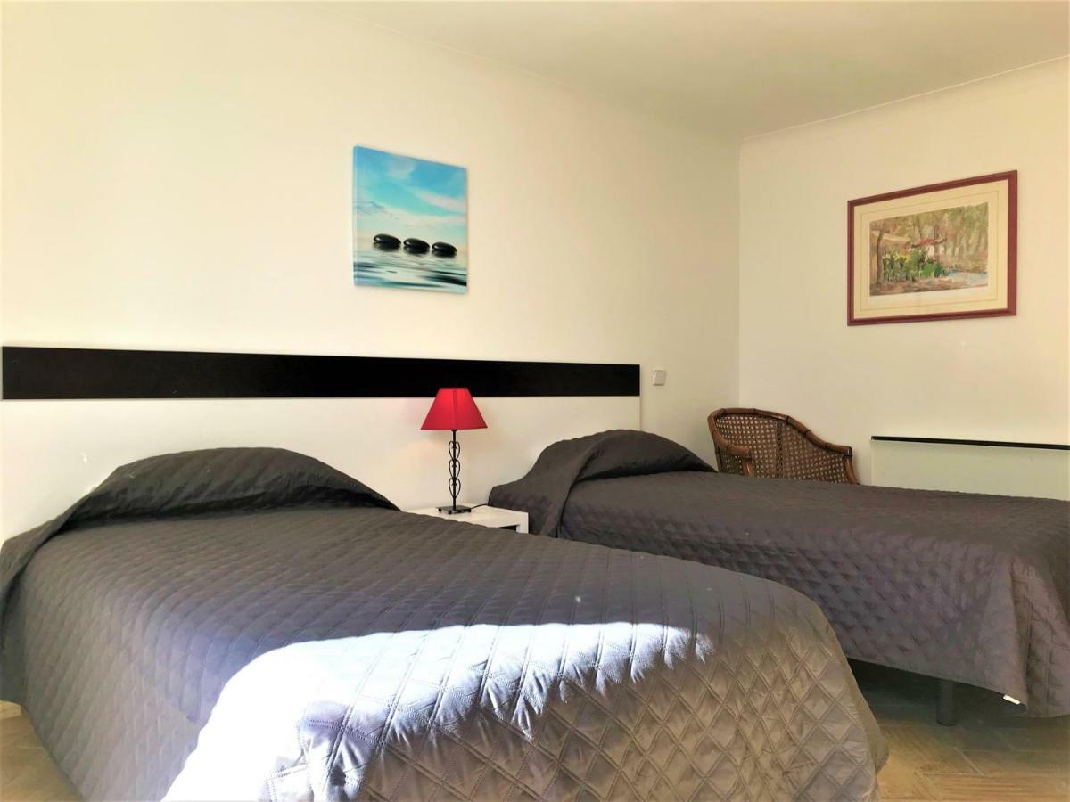 Casas Da Vila Praia Da Luz Bagian luar foto
