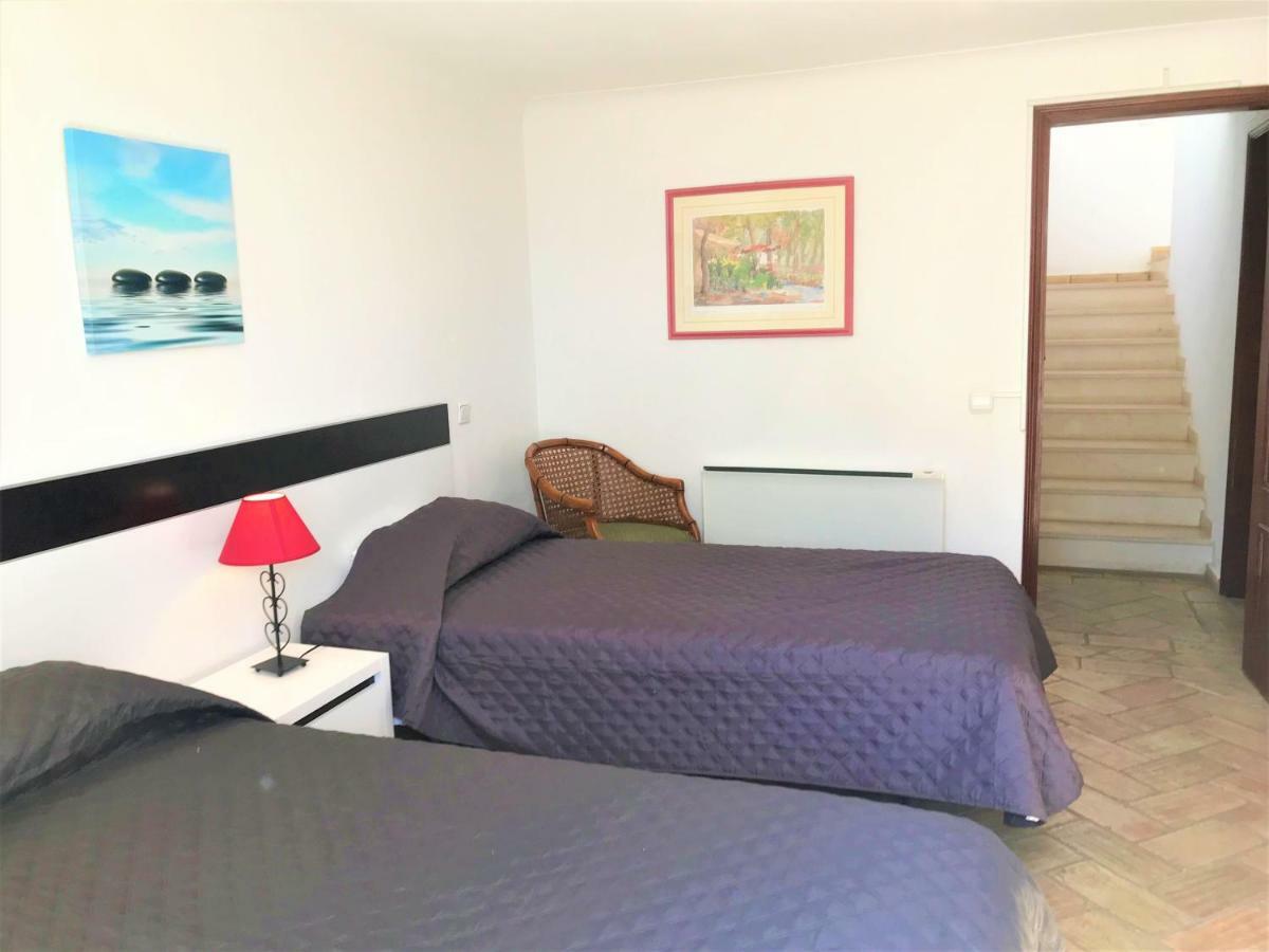 Casas Da Vila Praia Da Luz Bagian luar foto